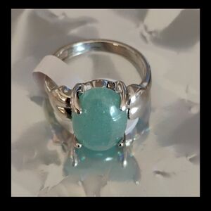 Large, moss green-blue aquamarine cabochon secured by claw prongs Size 9 Ring